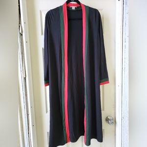 Long sleeve Cardigan featuring a lightweight construction, open front